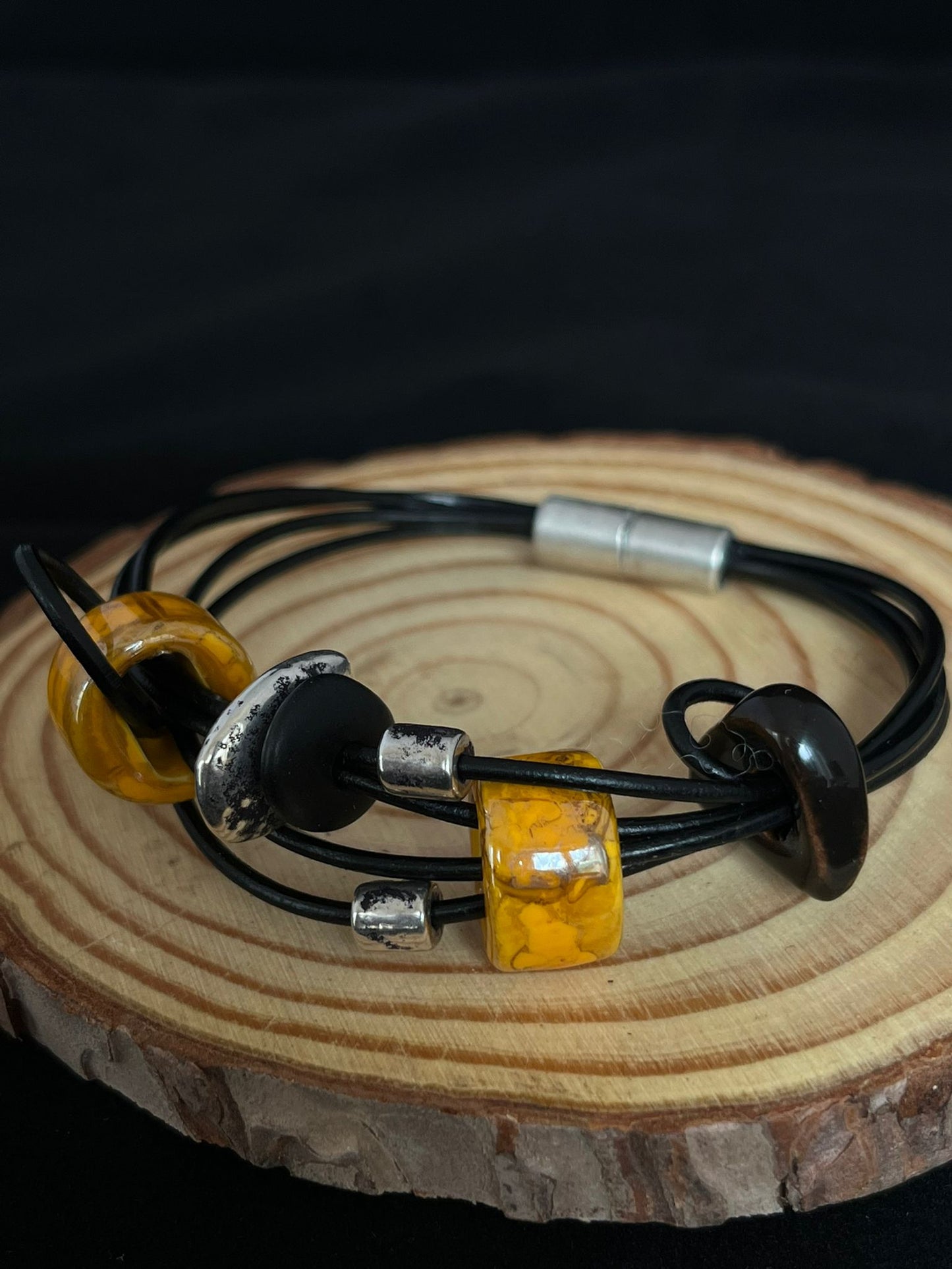 Ceramic bead bracelet in mustard, black, silver