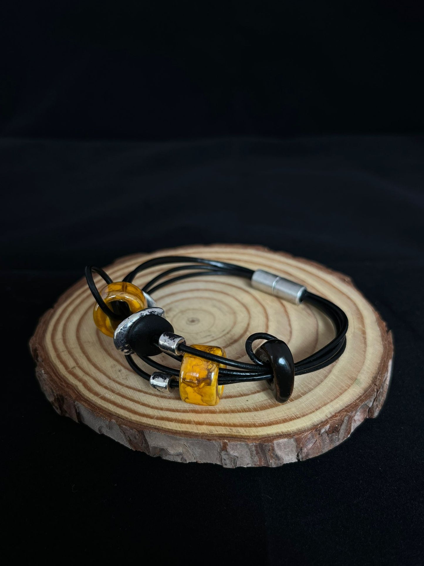 Handmade ceramic bead bracelet in mustard, black, silver