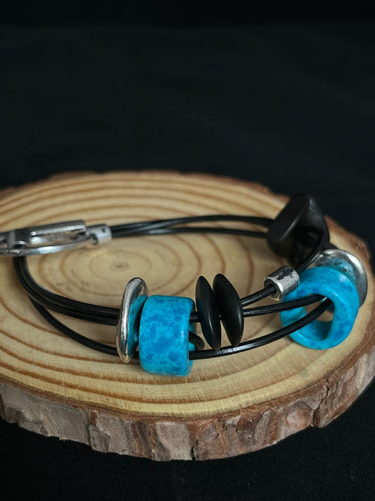 Ceramic bead bracelet in blue, black & silver