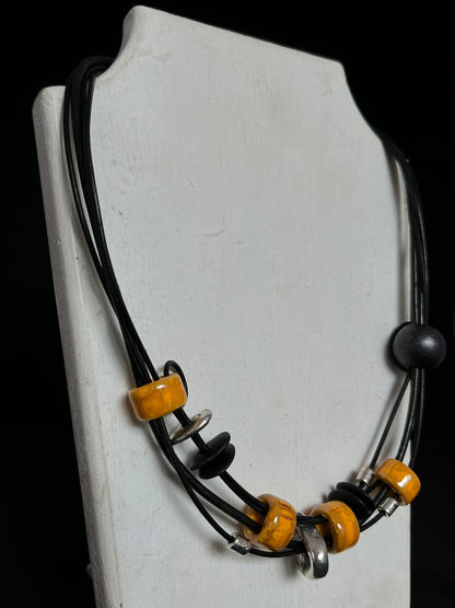 Handmade ceramic bead necklace in mustard